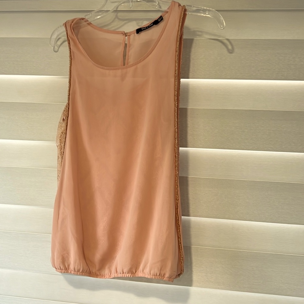 Salmon color top, with lace lining.